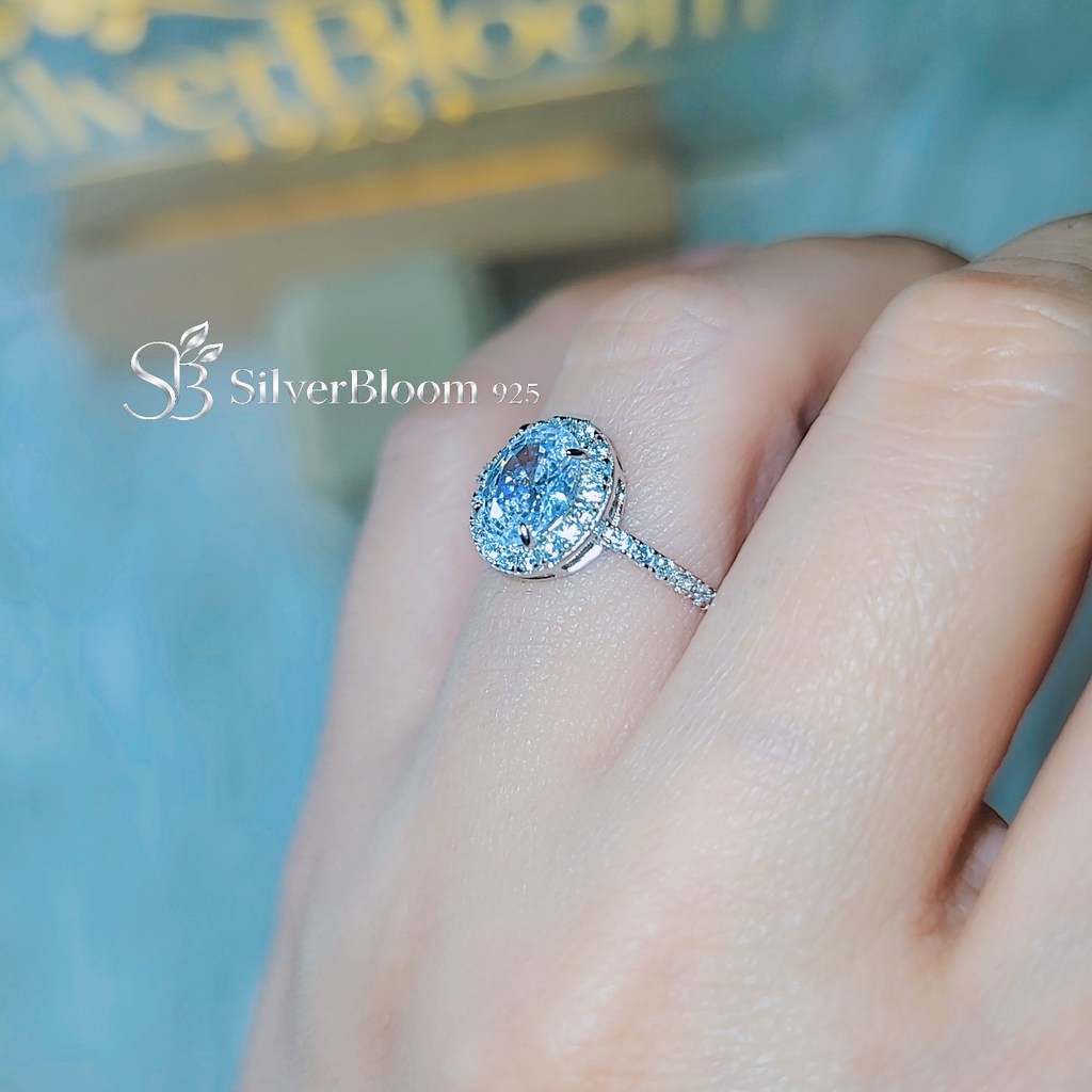 SilverBloom 925 Oval-Cut Cubic Zirconia Halo Ring with Pavé Band – Size 8