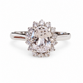 SilverBloom 925 Oval-Cut Cubic Zirconia Geometric Floral Halo Ring – Size 6