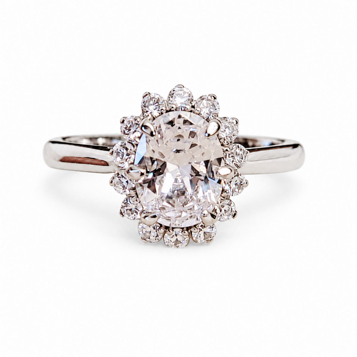 SilverBloom 925 Oval-Cut Cubic Zirconia Geometric Floral Halo Ring – Size 6