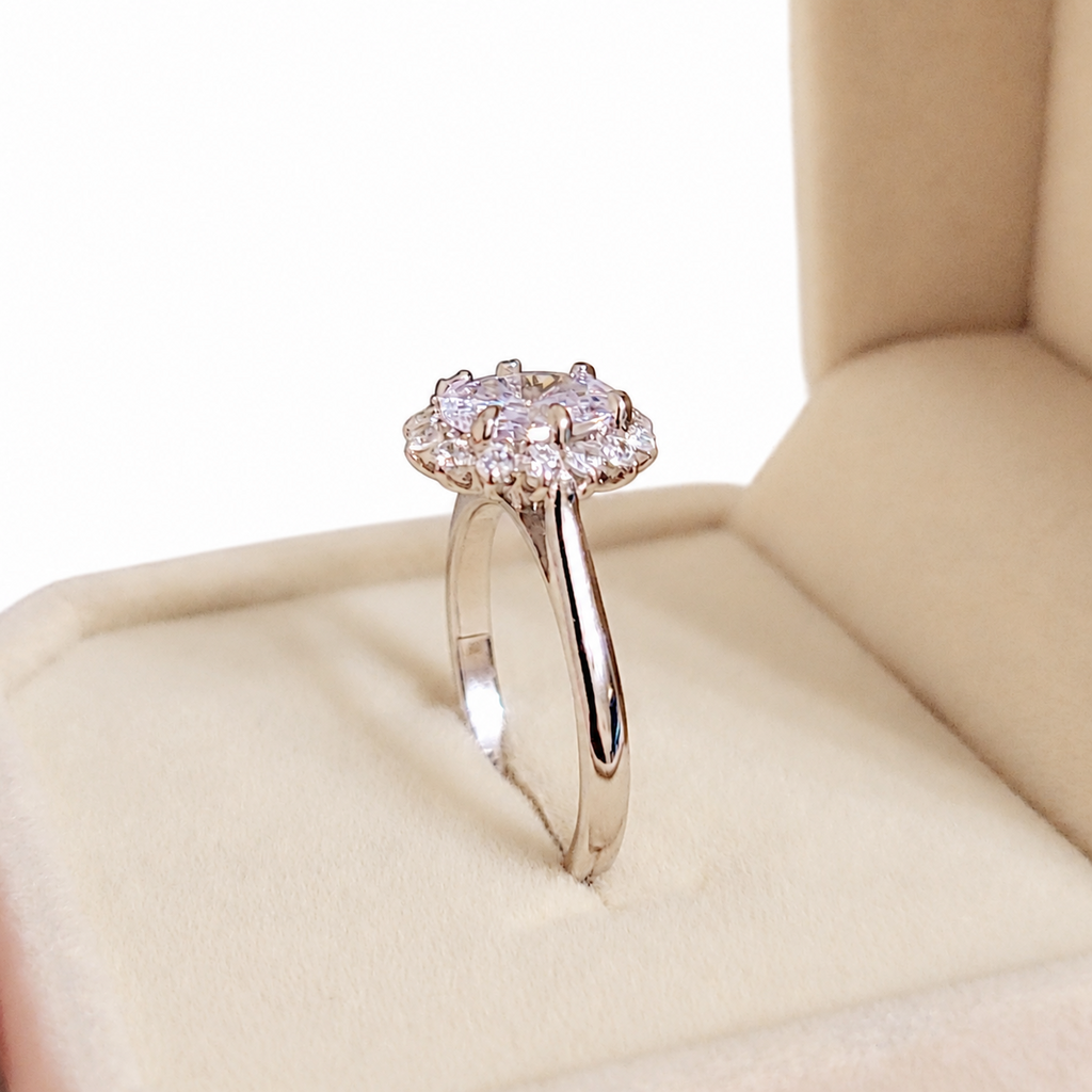 SilverBloom 925 Oval-Cut Cubic Zirconia Geometric Floral Halo Ring – Size 6