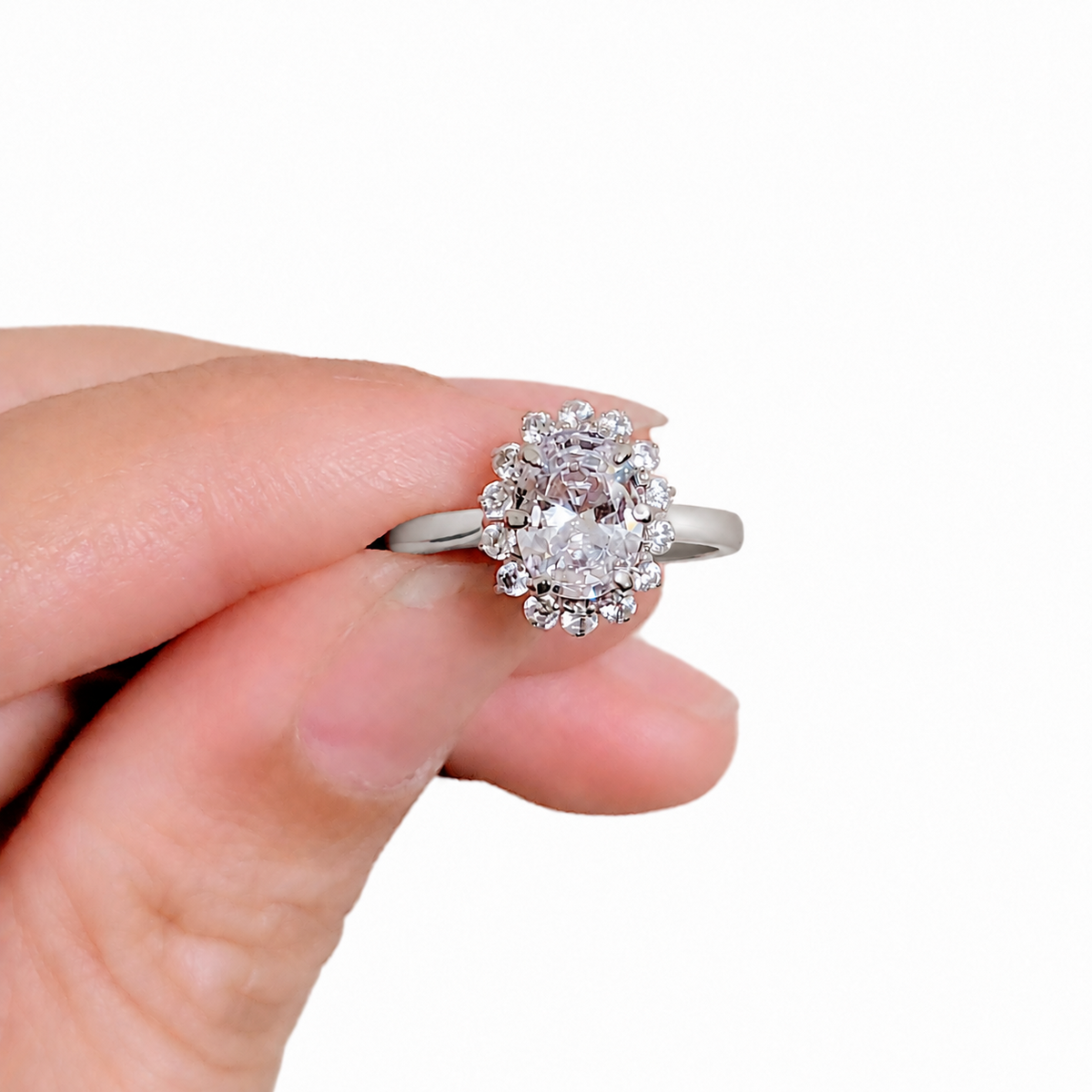 SilverBloom 925 Oval-Cut Cubic Zirconia Geometric Floral Halo Ring – Size 6