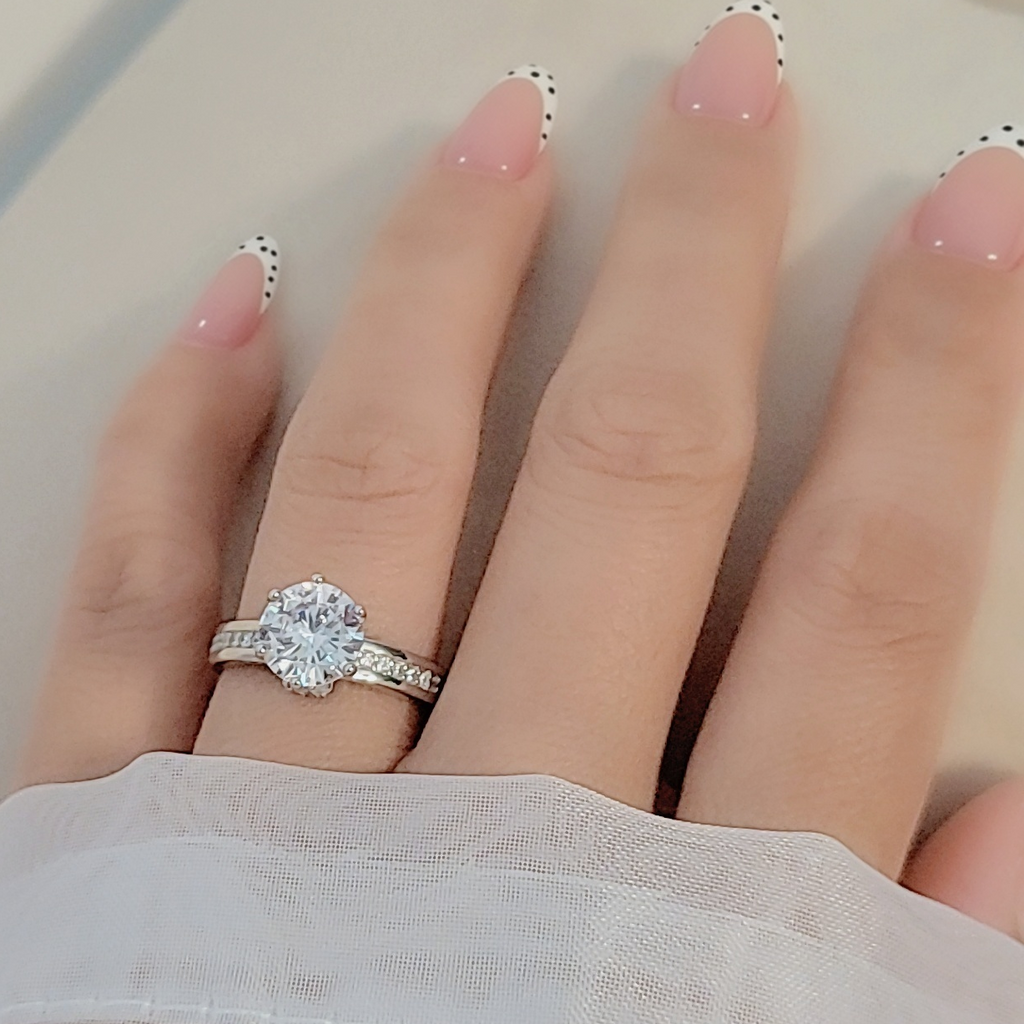 SilverBloom 925 Women's Round Cut Cubic Zirconia Solitaire Ring with Pavé Band – Size 7