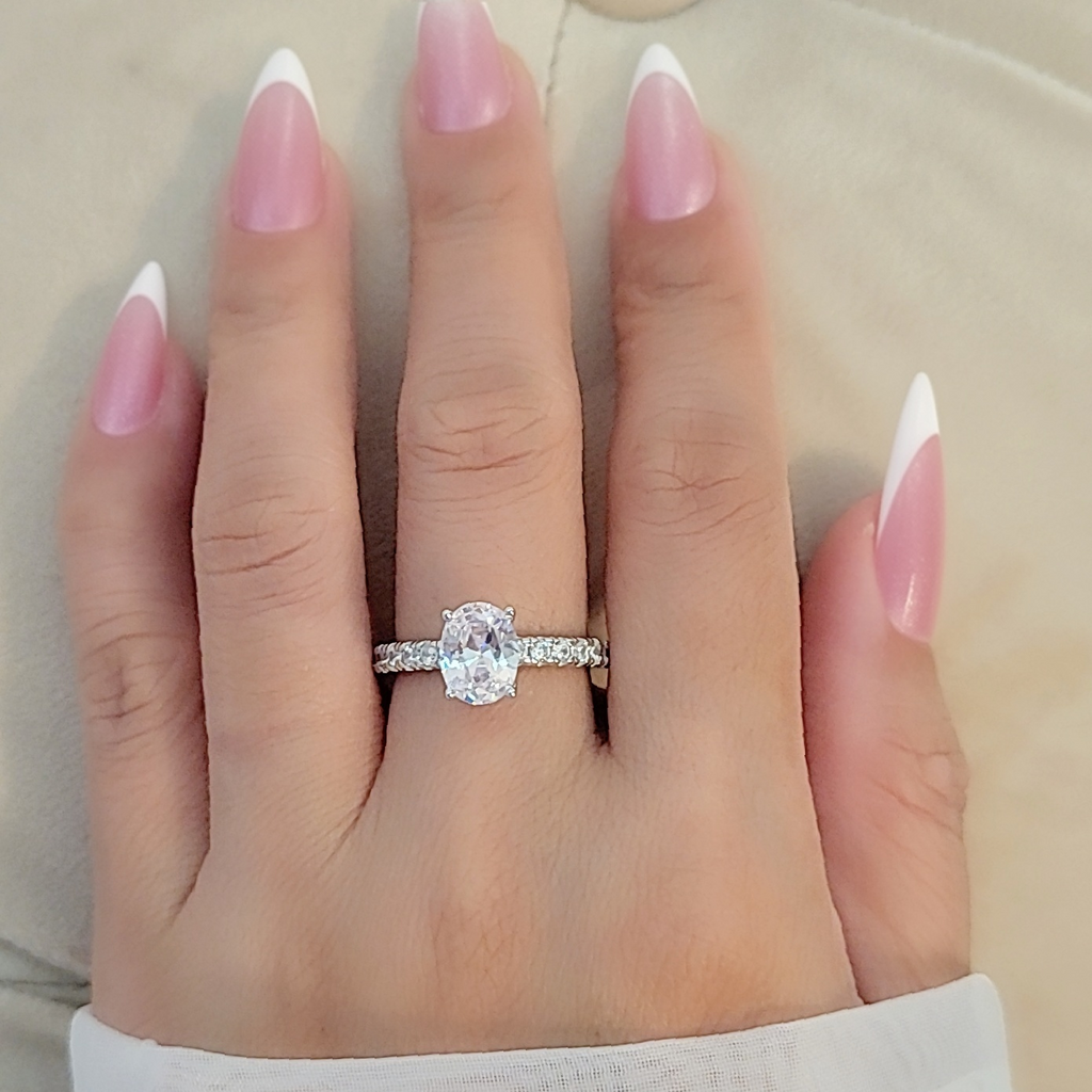SilverBloom 925 Oval-Cut Cubic Zirconia Solitaire Ring with Pavé Band – Size 8