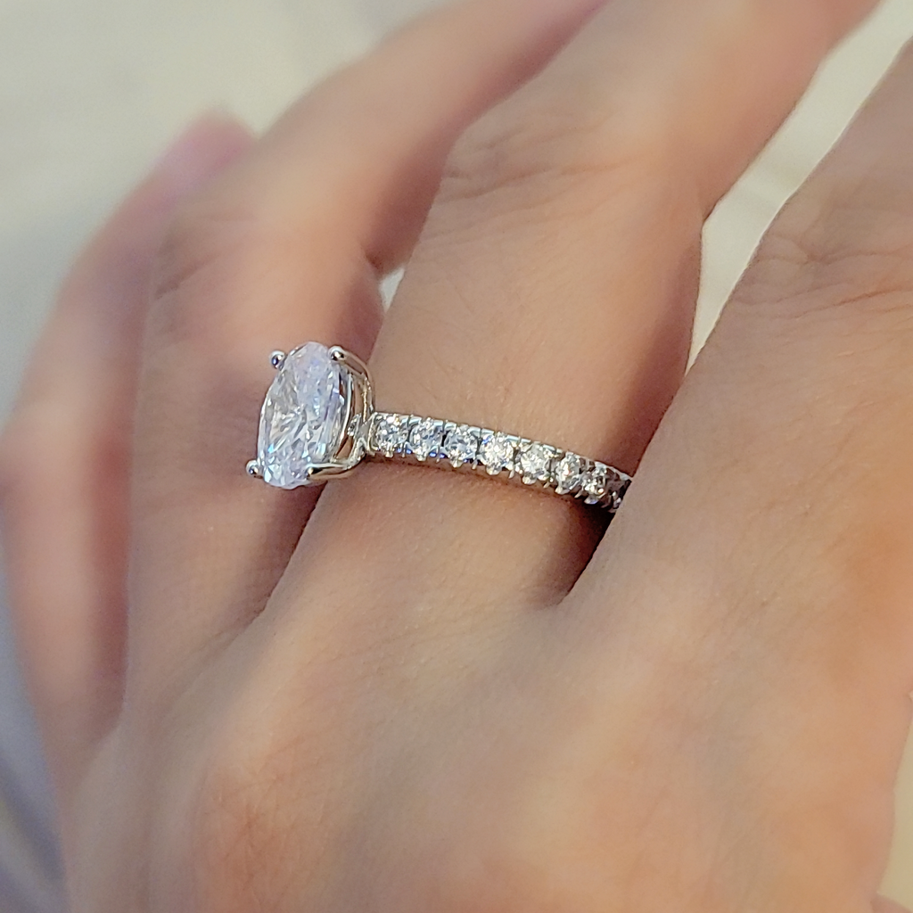 SilverBloom 925 Oval-Cut Cubic Zirconia Solitaire Ring with Pavé Band – Size 8