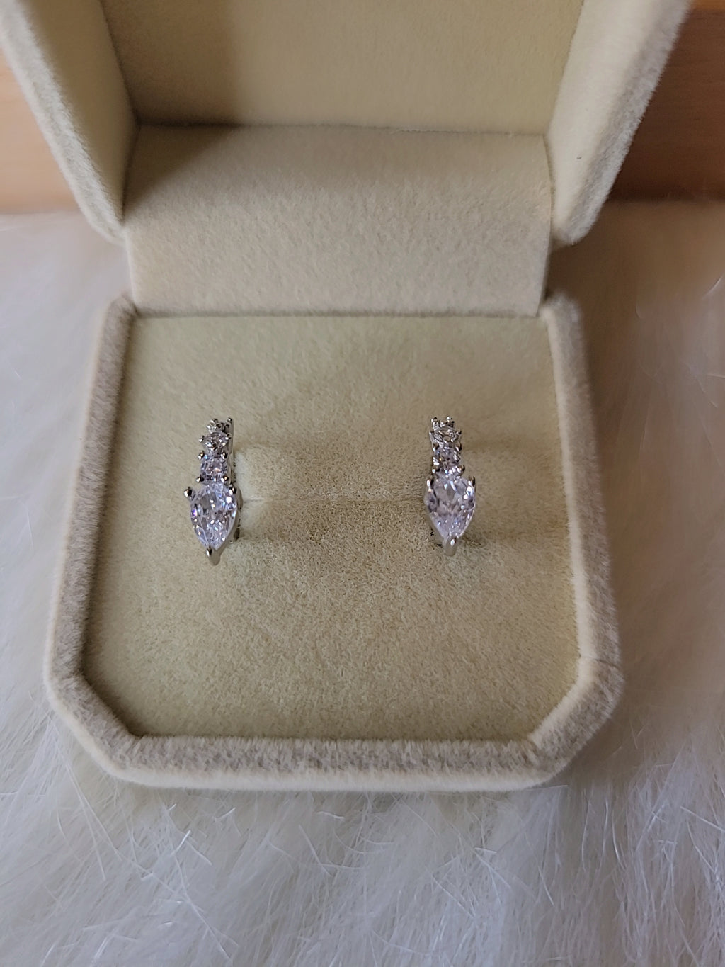 SilverBloom 925 Sterling Silver Teardrop CZ Huggie Earrings